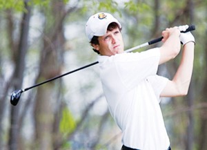 <span class='credit'>Photo Courtesy of Doug Witte, GVSU Photographer</span><span class='description'>Following Through: Senior Eric Lilleboe tees off in the Super Regional, which went on from May 4th to May 6th of this year.</span>