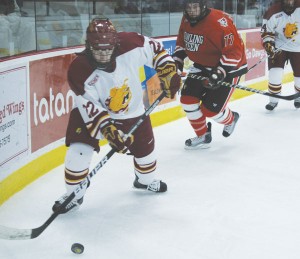 Controlling the Puck: Sophomore Derek Graham (#22) breaks away with the puck during Friday’s game against Bowling Green State. Ferris State pulled off a 5-1 victory, perpetuating their flawless 6-0-0 record for home games. Photo By: Kate Dupon | Photgrapher