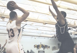 Pass It On: Senior Jon Yeazel (#23) makes a pass during a recent game. Photo By: Kate Dupon | Photographer