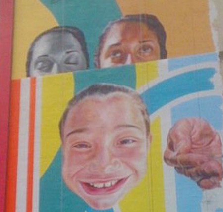 Pop Culture Paintings: The Kendall College mural features large contemporary pop culture and portraits. The paintings show real people from around the community. Photo courtesy of Terry Johnston