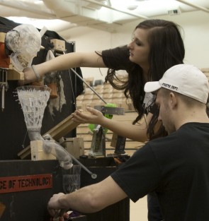 Complex Machines: Students from the Ferris State Rube Goldberg team work on making their machine just right for the Feb. 12 competition. Ferris currently holds two Guinness World Records for number of steps on a Goldberg machine. Photo By: Kate Dupon | Photo Editor Complex Machines: Students from the Ferris State Rube Goldberg team work on making their machine just right for the Feb. 12 competition. Ferris currently holds two Guinness World Records for number of steps on a Goldberg machine. Photo By: Kate Dupon | Photo Editor
