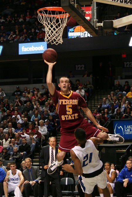 Career High: Matt DeHart leaps over a Laker defender to add another bucket to his 21 points, a career high, in the 131 Showdown game. Photo By: Brock Copus | Photographer Career High: Matt DeHart leaps over a Laker defender to add another bucket to his 21 points, a career high, in the 131 Showdown game. Photo By: Brock Copus | Photographer
