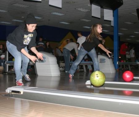 Bowling for Kids: Nicole Allen, left, and Samantha Evans, right, bowl during the Big Brother Big Sisters “Bowl for Kids’ Sake” at the Gate. The event was a fundraising opportunity that took place on March 22-23 and raised $6,000. Photo By: Kate Dupon | Photo Editor Bowling for Kids: Nicole Allen, left, and Samantha Evans, right, bowl during the Big Brother Big Sisters “Bowl for Kids’ Sake” at the Gate. The event was a fundraising opportunity that took place on March 22-23 and raised $6,000. Photo By: Kate Dupon | Photo Editor
