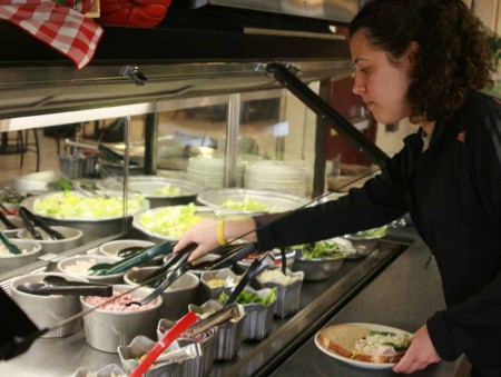 Eating Healthy: Liala Al-Shatel reaches for some healthy food options at Westview Dining Center. Students have a variety of healthy options available for them on campus. Photo By: Kate Dupon | Photo Editor