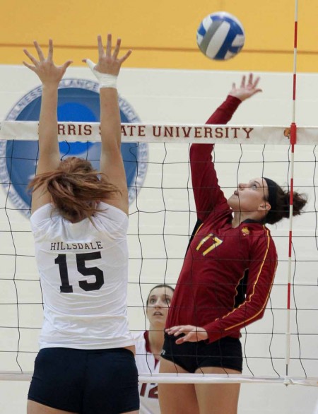 Women’s Volleyball : FSU junior outside hitter Aly Brecht looks to spike against Hillsdale during a 2011 match. The Bulldogs competed in the GLIAC Crossover Tournment on Oct. 14-15 where they went 2-1. Torch File Photo Women’s Volleyball : FSU junior outside hitter Aly Brecht looks to spike against Hillsdale during a 2011 match. The Bulldogs competed in the GLIAC Crossover Tournment on Oct. 14-15 where they went 2-1. Torch File Photo