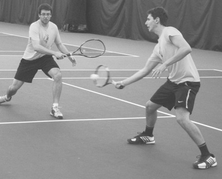 It Takes Two: Bulldogs Tyler Marengo and Sergiu Laza (left to right) work together during a doubles match against Grand Valley State. The duo would defeat the pair of Lakers 8-5. Photo By: Eric Trandel | Photographer