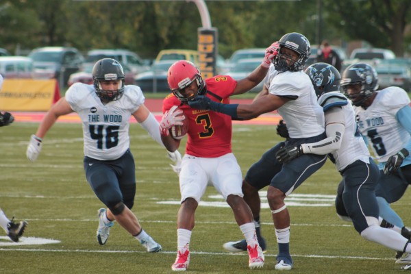 Junior slot receiver Jamel Lockett fights for extra yards early in the second quarter.