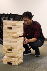 Ferris student Joe Hilsbos played giant Jenga at the University Center one-year celebration. 